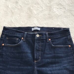 Like new Loft skinny jeans with fringe hem